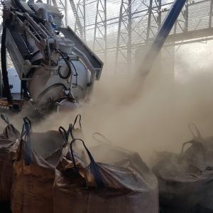 Discharging Dry Powder Materials 