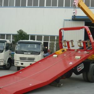 Wrecker Tow truck with Self Loading Flat Bed and Crane.